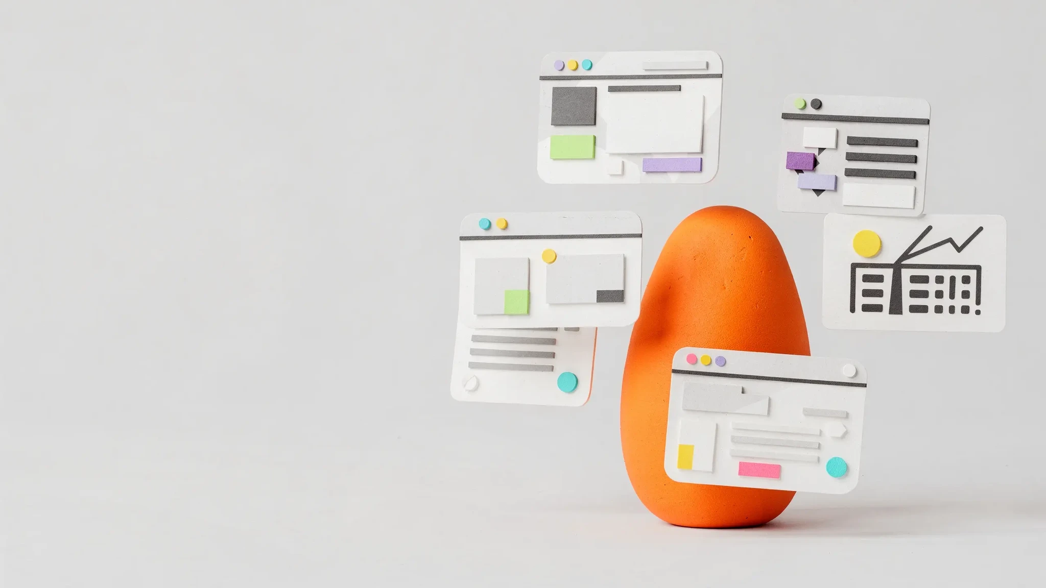 An orange assistant organising website, calendar and marketing cards